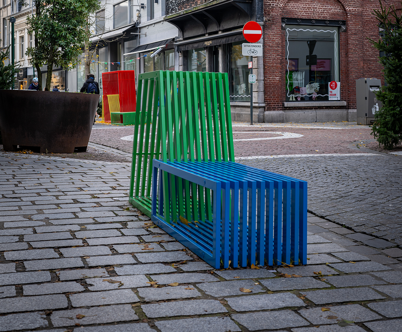 This Modular Bench creates a place for sitting, playing and relaxing. Each element slides into the other creating an interwave-like pattern of color and form.