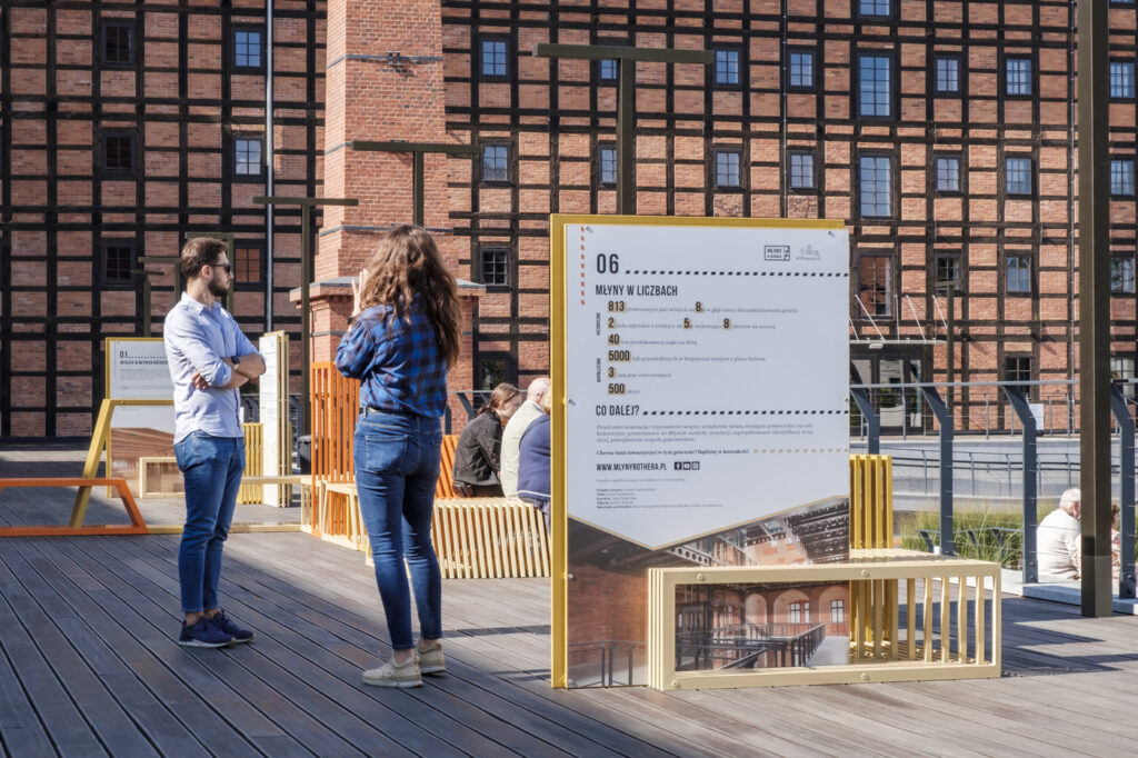 After Milan, Copenhagen and Gdynia, the Intersections installation has been commissioned by the Rother Mills in Poland. The installation combines an outdoor seating and relaxation area with an open-air exhibition.

Designed with the city's inhabitants in mind, the exhibition's multi-functionality and open form were important. Thanks to the smart integration of information boards with the seating system, visitors have the opportunity to learn about the history of the recently refurbished mills and plans related to their modernization. Archival drawings of the Mills from the mid-19th century and photos from before the renovation are displayed, among others. The installation harmonizes with the buildings in form and color but at the same time it introduces a new, fresh element to the space. Adapted to the surroundings, Intersections invites people to play, rest and explore. In this way, it's useful to everyone - old and young. Modularity allows for the freedom to reconfigure the installation in the future, so that it can be used in another area of the Mills after the complete opening of the complex.

 